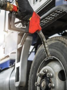 Semi Truck Driver About to Refuel His Tractor Truck with Diesel Fuel