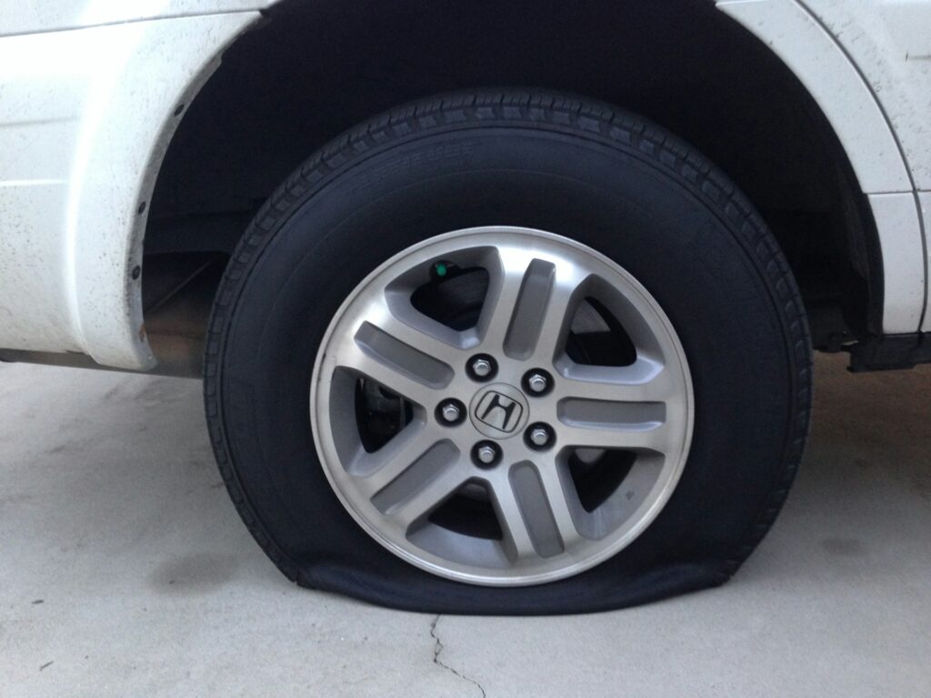 Flat Tire - Needs Regular Vehicle Maintenance